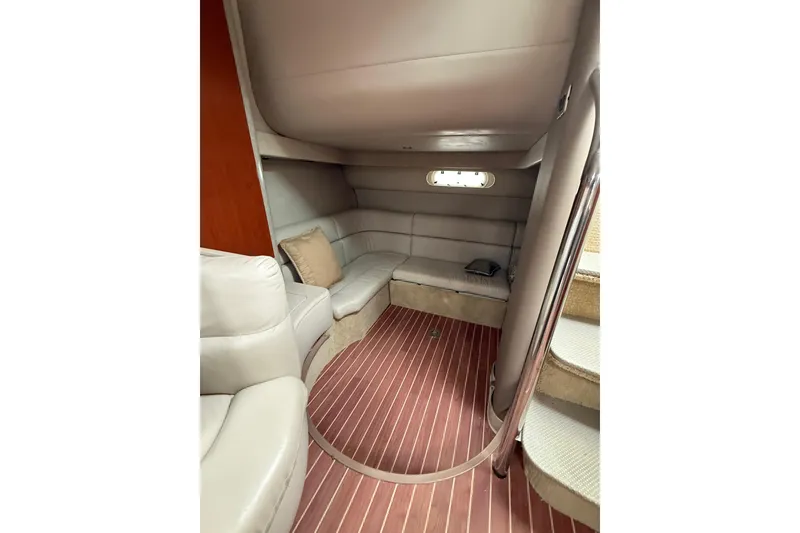 Slide: The Image of Interior of 2006 Formula 40 Performance Cruiser with plush seating and wooden flooring. - 54