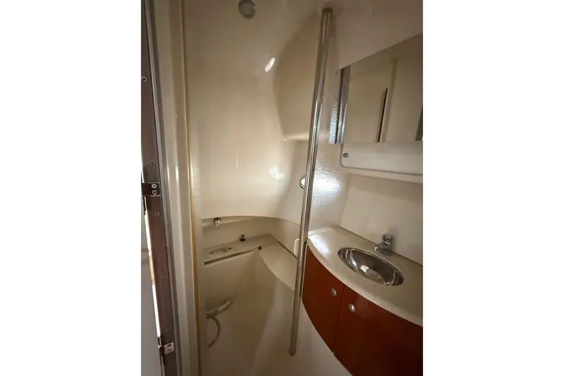Slide: The Image of 2006 Formula 40 Performance Cruiser bathroom with sink and shower area. - 56