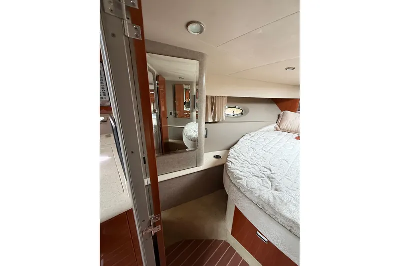 Slide: The Image of Interior of 2006 Formula 40 Performance Cruiser with cozy bed and mirror. - 57