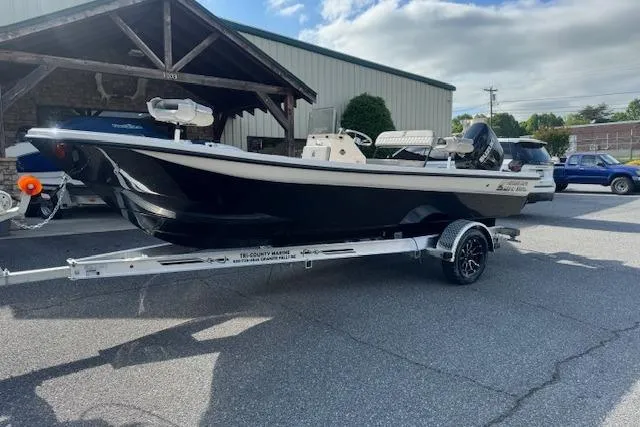 Slide: The Image of 2026 Carolina Skiff 192 JLS boat on trailer, parked outdoors. - 4