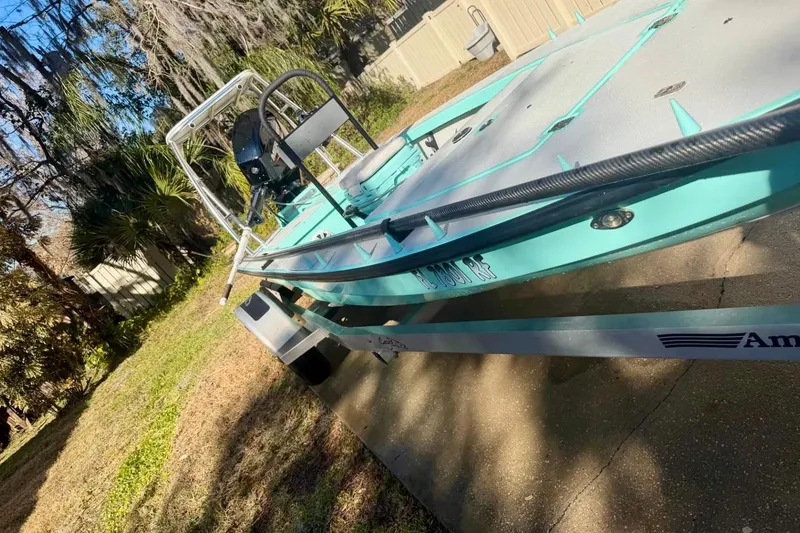 Slide: The Image of 2017 Cayo Boatworks 173 on trailer, parked outdoors in a sunny yard. - 9