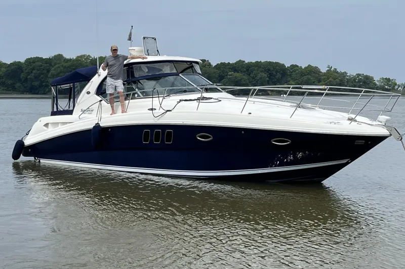 The Image of 2007 Sea Ray 380 Sundancer yacht on calm water with a person on deck. - 0