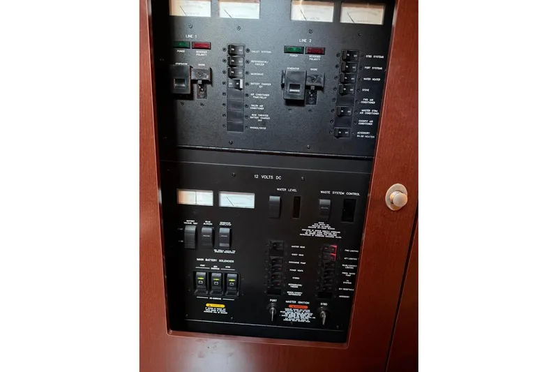 Slide: The Image of Electrical control panel on a 2007 Sea Ray 380 Sundancer boat. - 18
