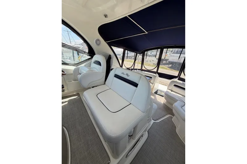 Slide: The Image of Luxurious interior of 2007 Sea Ray 380 Sundancer with plush seating and elegant design. - 9