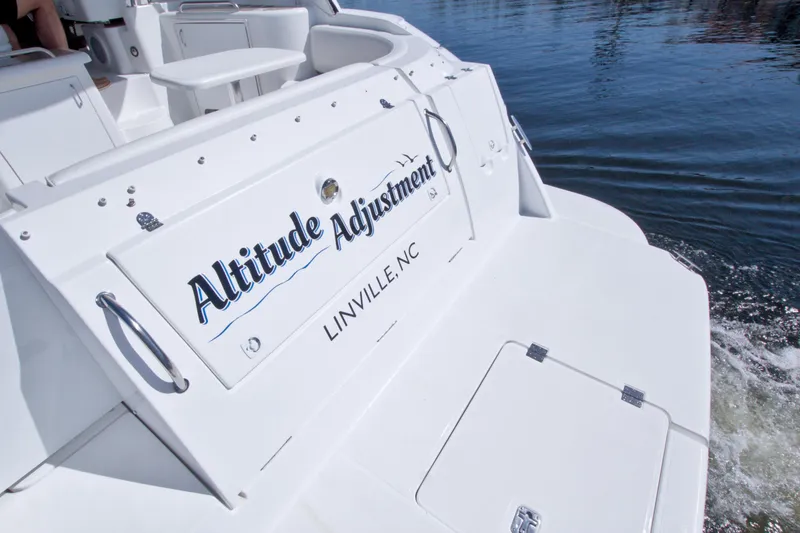 Slide: The Image of 2008 Cruisers Yachts 420 Express named "Altitude Adjustment" on water, Linville, NC. - 12