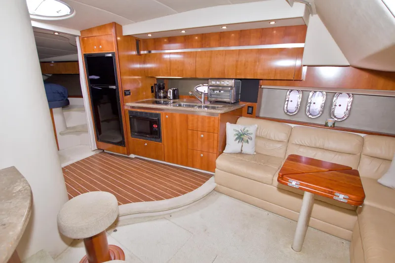 Slide: The Image of Luxurious 2008 Cruisers Yachts 420 Express interior with kitchenette and seating area. - 39