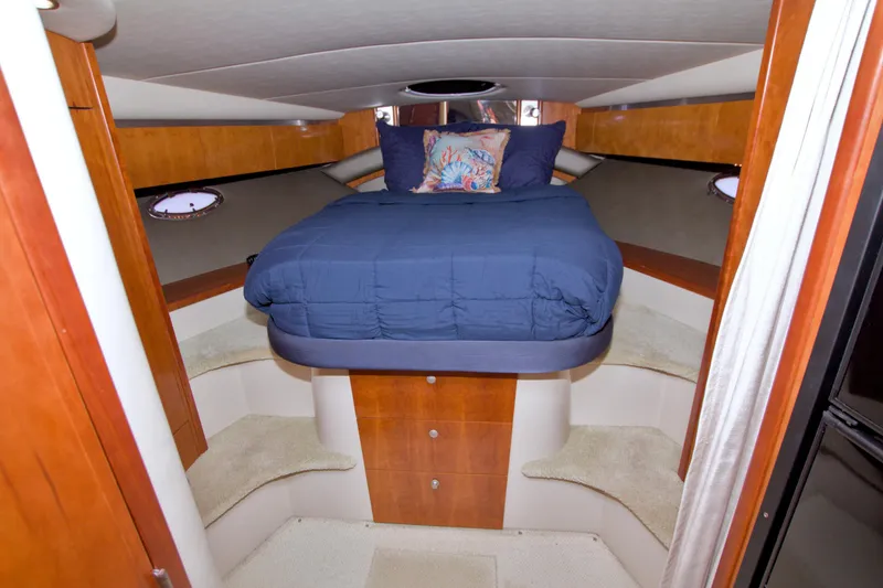 Slide: The Image of Luxurious cabin interior of 2008 Cruisers Yachts 420 Express with cozy bed. - 42
