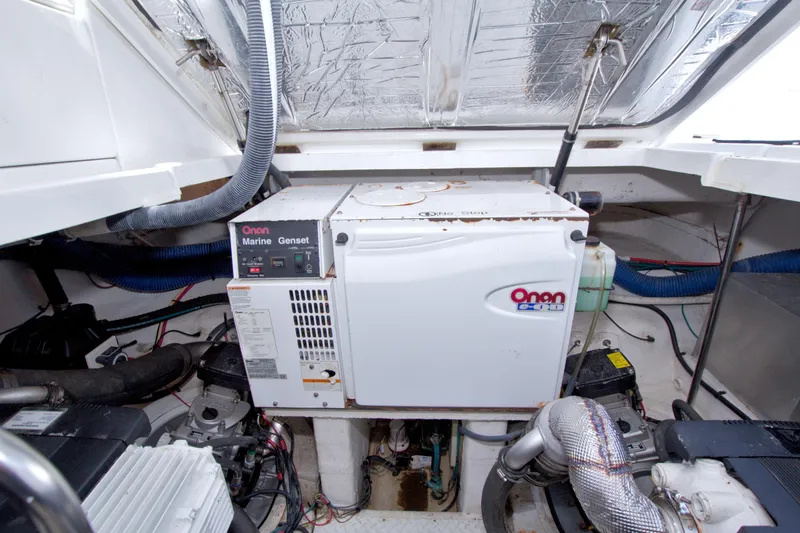 Slide: The Image of Engine room of 2008 Cruisers Yachts 420 Express with Onan Marine generator. - 54