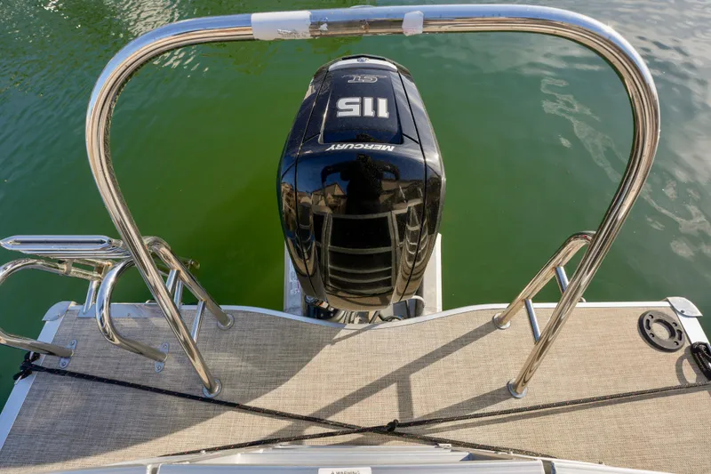 Slide: The Image of 2023 Berkshire 24 RFX LE 2.75 boat with Mercury 115 outboard motor on water. - 16