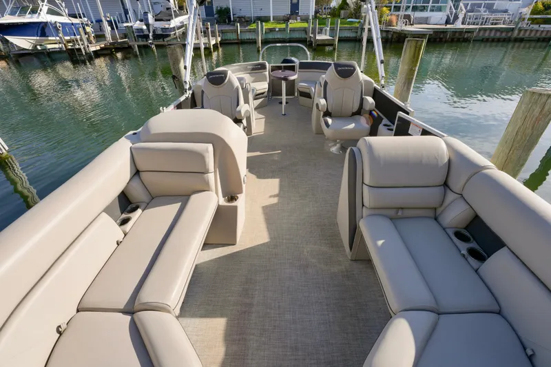 Slide: The Image of 2023 Berkshire 24 RFX LE 2.75 pontoon boat with spacious seating and modern design. - 3