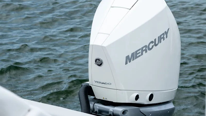 Slide: The Image of 2026 Sea Ray SDX 230 with Mercury Verado outboard motor. - 16