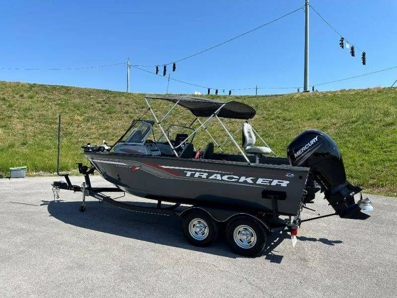 Slide: The Image of 2019 Tracker Targa V18 boat with trailer on parking lot. - 10