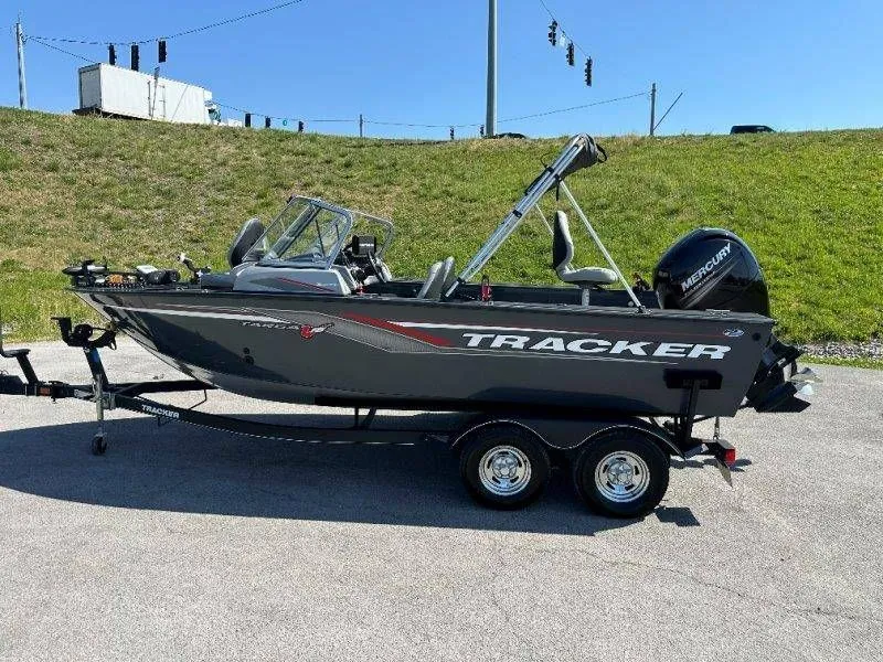 Slide: The Image of 2019 Tracker Targa V18 boat on trailer outdoors. - 12