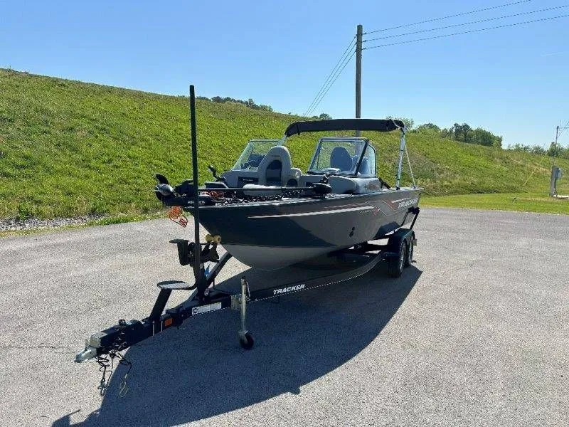 Slide: The Image of 2019 Tracker Targa V18 boat on trailer, sunny day. - 14