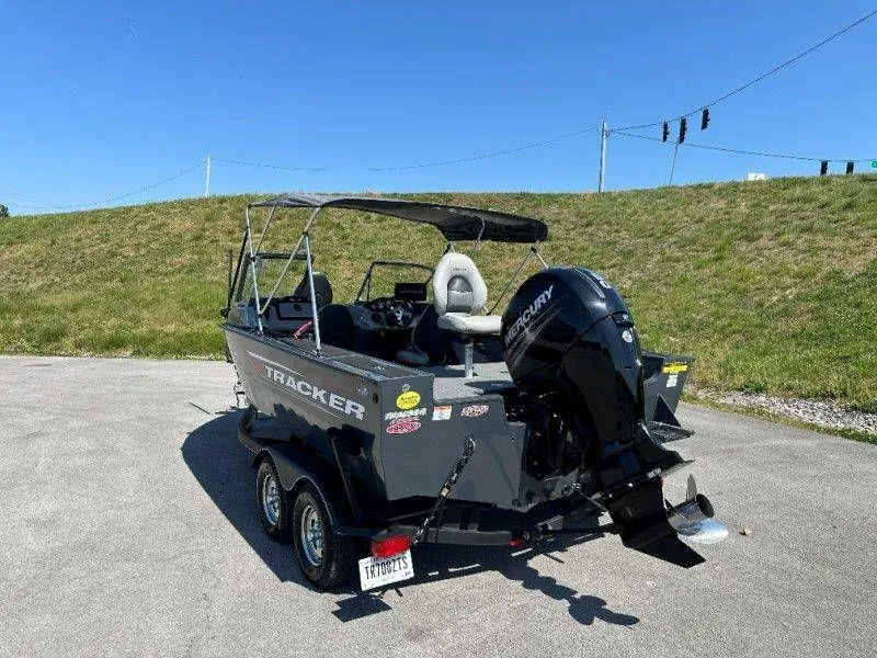 Slide: The Image of 2019 Tracker Targa V18 boat with Mercury engine on trailer. - 16