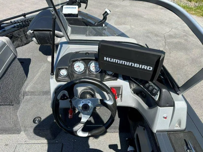 Slide: The Image of Interior of a 2019 Tracker Targa V18 boat with Humminbird display. - 18