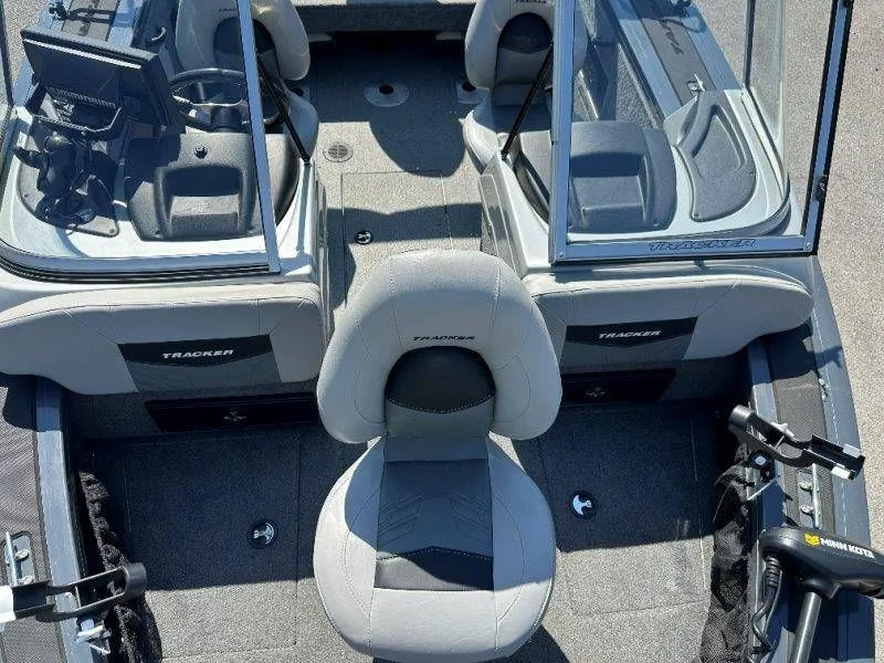Slide: The Image of Interior view of a 2019 Tracker Targa V18 boat with gray seats. - 21