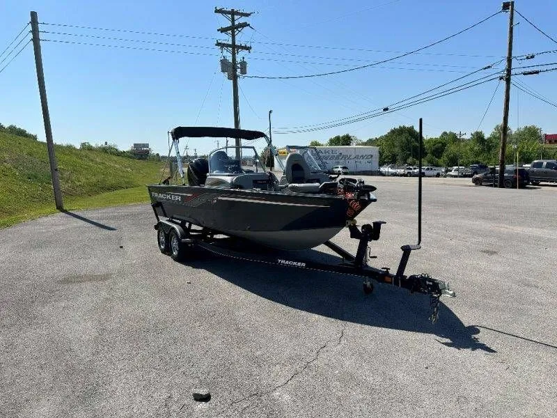 Slide: The Image of 2019 Tracker Targa V18 boat parked on trailer outdoors. - 32