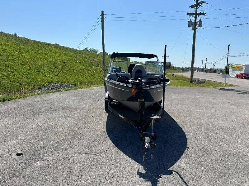 Slide: The Image of 2019 Tracker Targa V18 boat on trailer, parking lot view. - 33