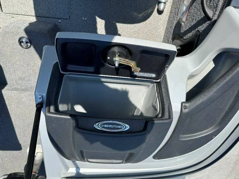 Slide: The Image of 2019 Tracker Targa V18 boat with open storage compartment. - 34