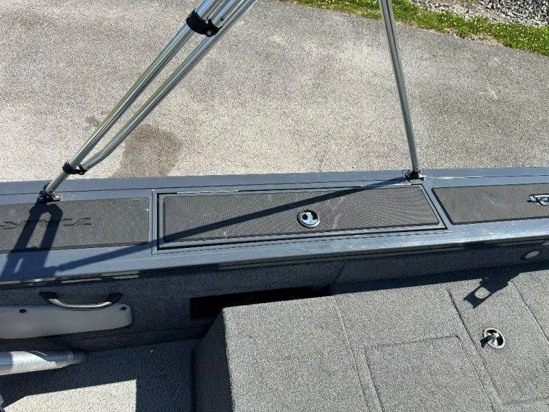 Slide: The Image of 2019 Tracker Targa V18 boat canopy and deck view. - 38