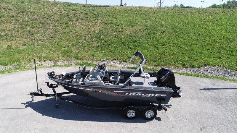 Slide: The Image of 2019 Tracker Targa V18 boat on trailer, side view. - 4