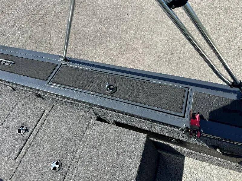 Slide: The Image of 2019 Tracker Targa V18 boat deck with storage and mounts. - 40