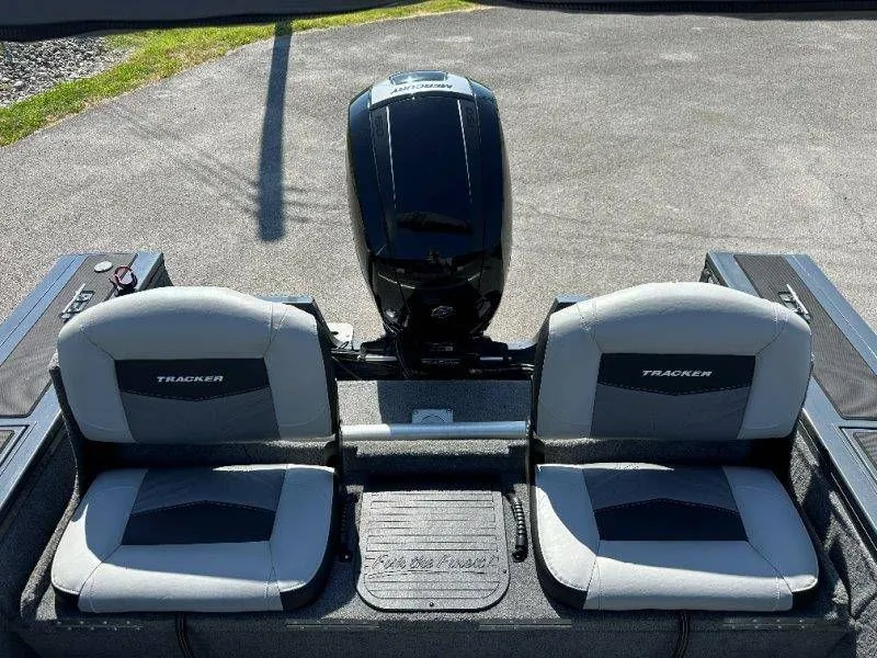 Slide: The Image of 2019 Tracker Targa V18 boat rear with motor and seats. - 42