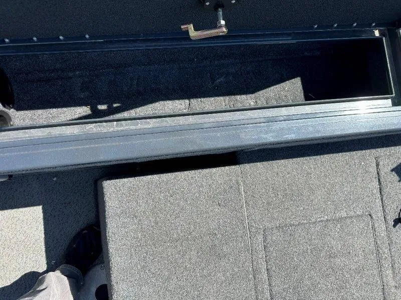 Slide: The Image of Interior of a 2019 Tracker Targa V18 boat with storage compartment. - 43