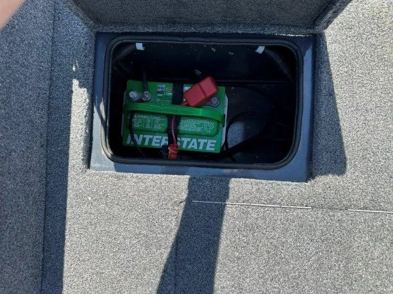 Slide: The Image of Interstate battery in 2019 Tracker Targa V18 boat compartment. - 44