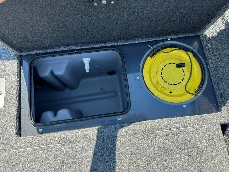 Slide: The Image of 2019 Tracker Targa V18 boat tank and storage compartment. - 45