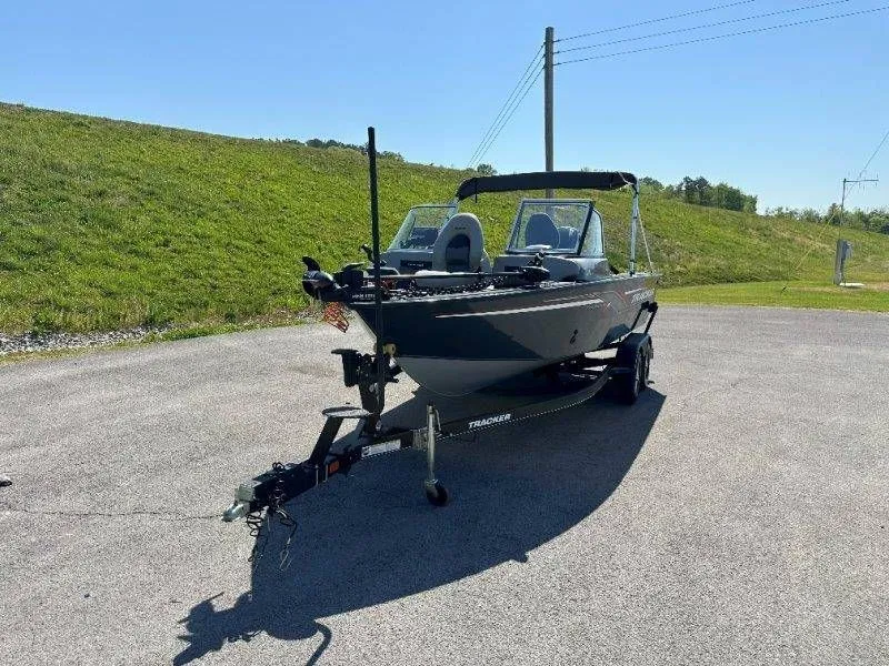 Slide: The Image of 2019 Tracker Targa V18 boat on trailer parked outdoors. - 8