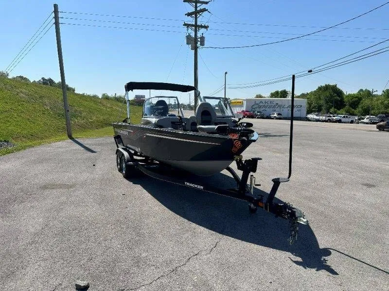 Slide: The Image of 2019 Tracker Targa V18 boat parked on trailer outdoors. - 9