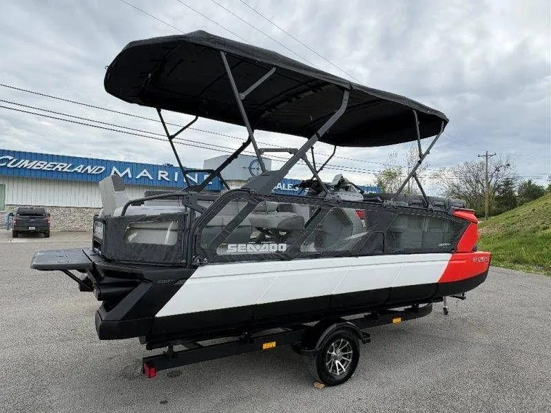 Slide: The Image of 2023 Sea-Doo Switch Cruise 21 pontoon boat on trailer. - 12