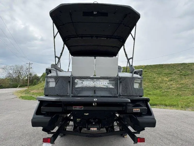 Slide: The Image of Rear view of 2023 Sea-Doo Switch Cruise 21 on trailer. - 19
