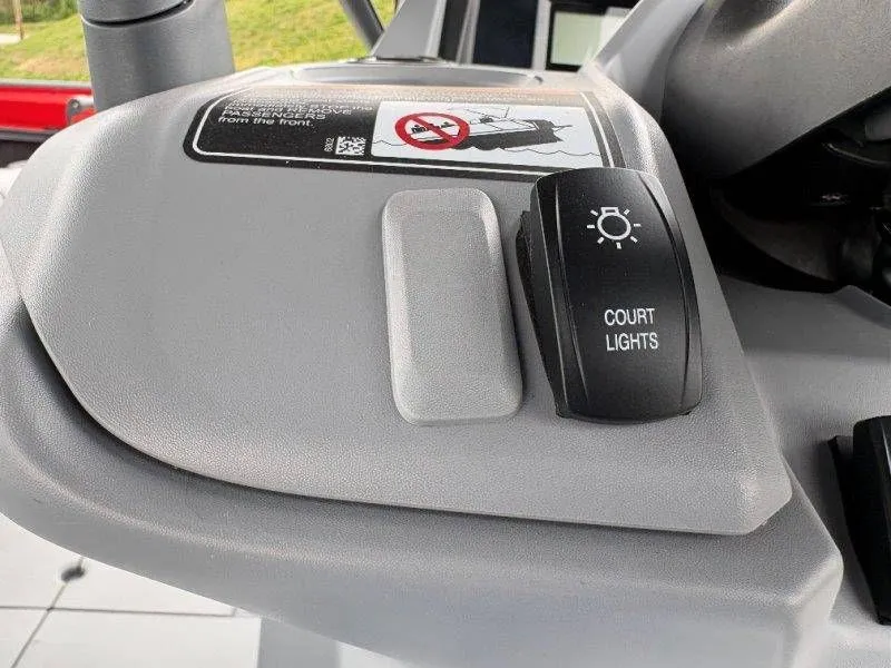 Slide: The Image of Court lights switch in 2023 Sea-Doo Switch Cruise 21 model. - 24