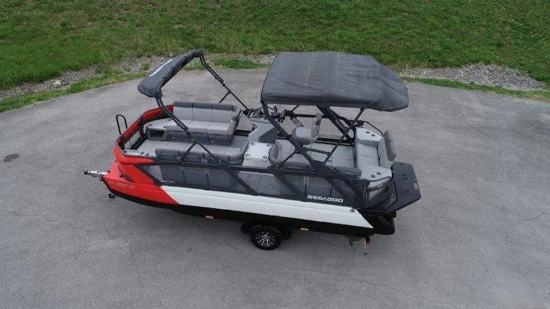 Slide: The Image of 2023 Sea-Doo Switch Cruise 21 pontoon boat on trailer. - 3