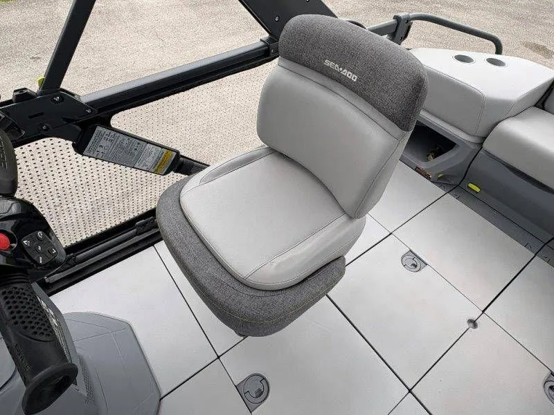 Slide: The Image of 2023 Sea-Doo Switch Cruise 21 seating area with gray upholstery. - 40