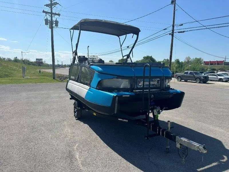 Slide: The Image of 2022 Sea-Doo Switch Cruise 18 on trailer, blue pontoon boat. - 11
