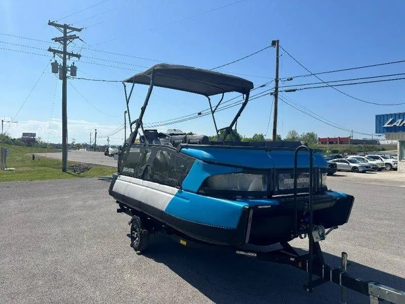 Slide: The Image of 2022 Sea-Doo Switch Cruise 18 on trailer, blue sky. - 13