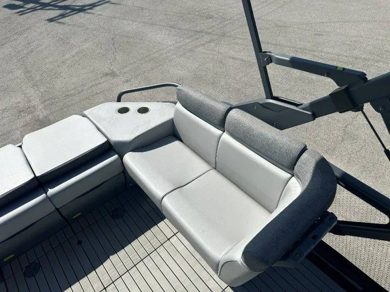 Slide: The Image of Interior of 2022 Sea-Doo Switch Cruise 18 with gray seating. - 17