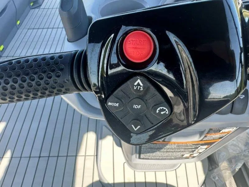 Slide: The Image of 2022 Sea-Doo Switch Cruise 18 control panel with start button. - 19