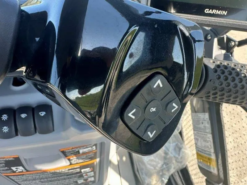 Slide: The Image of 2022 Sea-Doo Switch Cruise 18 control panel with Garmin display. - 21