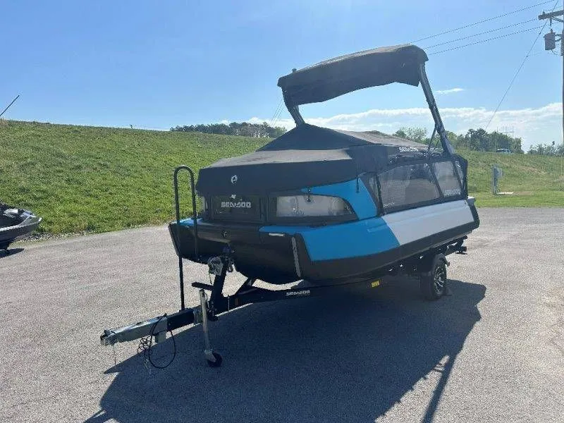 Slide: The Image of 2022 Sea-Doo Switch Cruise 18 on trailer, blue pontoon boat. - 35