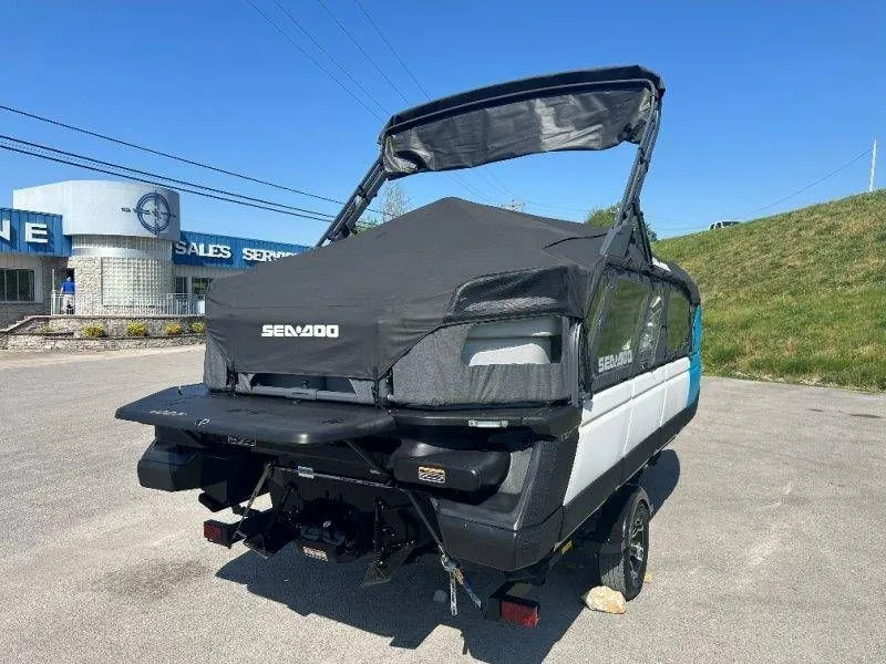 Slide: The Image of 2022 Sea-Doo Switch Cruise 18 with cover on trailer. - 36