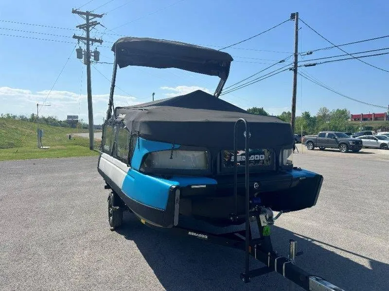 Slide: The Image of 2022 Sea-Doo Switch Cruise 18 on trailer, blue pontoon boat. - 37