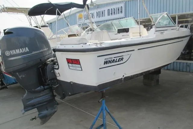 The Image of 1999 Boston Whaler 20 Ventura Bowrider with Yamaha outboard at marina for sale. - 0