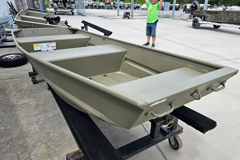 Slide: The Image of 2026 Tracker Grizzly 12 Jon boat on display, showcasing its sturdy design and spacious interior. - 6