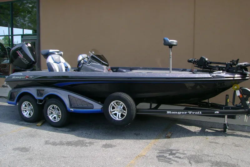Slide: The Image of 2026 Ranger Z519R Cup-Equipped boat on trailer, sleek design, dual seats, and powerful engine. - 3