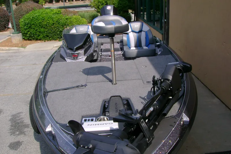 Slide: The Image of 2026 Ranger Z519R Cup-Equipped boat with advanced Garmin equipment, parked outdoors. - 5